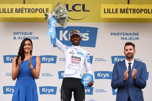 Guest, Intermarch - Wanty team's Eritrean rider Biniam Girmay celebrates on the podium with the best young rider's white jersey after the 1st stage of the 112th edition of the Tour de France cycling race, 184.9 km starting and finishing in Lille Metropole, northern France, on July 5, 2025. (Photo by Anne-Christine POUJOULAT / AFP)