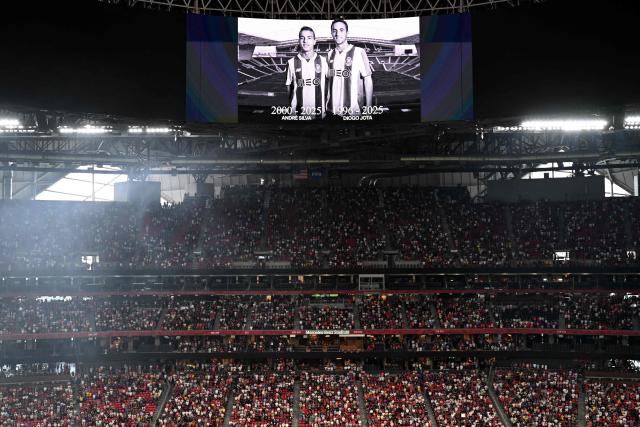View of a screen with the image of Liverpool's Portuguese forward Diogo Jota and his brother Andre Silva, who passed away after a car crash, during a minute of silence in their honor ahead of the FIFA Club World Cup 2025 quarterfinal football match between France's Paris Saint-Germain and Germany's Bayern Munich at the Mercedes-Benz Stadium in Atlanta on July 5, 2025. (Photo by Roberto SCHMIDT / AFP)