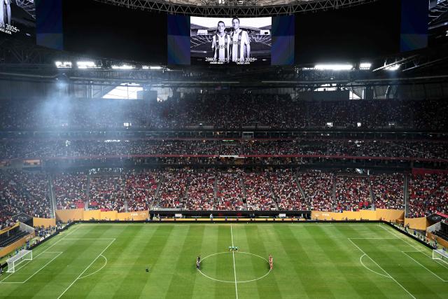 Paris Saint-Germain and Bayern Munich players observe a minute of silence to pay tribute to Liverpool's Portuguese forward Diogo Jota and his brother Andre Silva, who passed away after a car crash, ahead of the FIFA Club World Cup 2025 quarterfinal football match between France's Paris Saint-Germain and Germany's Bayern Munich at the Mercedes-Benz Stadium in Atlanta on July 5, 2025. (Photo by ROBERTO SCHMIDT / AFP)