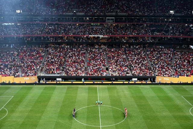 Paris Saint-Germain and Bayern Munich players observe a minute of silence to pay tribute to Liverpool's Portuguese forward Diogo Jota and his brother Andre Silva, who passed away after a car crash, ahead of the FIFA Club World Cup 2025 quarterfinal football match between France's Paris Saint-Germain and Germany's Bayern Munich at the Mercedes-Benz Stadium in Atlanta on July 5, 2025. (Photo by ROBERTO SCHMIDT / AFP)