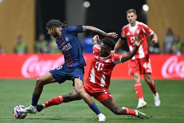 Paris Saint-Germain's French forward #29 Bradley Barcola and Bayern Munich's French forward #11 Kingsley Coman fight for the ball during the FIFA Club World Cup 2025 quarterfinal football match between France's Paris Saint-Germain and Germany's Bayern Munich at the Mercedes-Benz Stadium in Atlanta on July 5, 2025. (Photo by PATRICIA DE MELO MOREIRA / AFP)