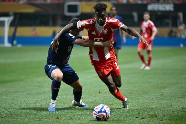 Paris Saint-Germain's Portuguese midfielder #87 Joao Pedro Goncalves Neves and Bayern Munich's French forward #11 Kingsley Comanfight for the ball during the FIFA Club World Cup 2025 quarterfinal football match between France's Paris Saint-Germain and Germany's Bayern Munich at the Mercedes-Benz Stadium in Atlanta on July 5, 2025. (Photo by PATRICIA DE MELO MOREIRA / AFP)