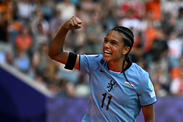 Netherlands' forward #11 Esmee Brugts celebrates after she scored the third goal of the match during the UEFA Women's Euro 2025 Group D football match between Wales and The Netherlands at the Allmend Stadion Luzern in Lucerne on July 5, 2025. (Photo by Fabrice COFFRINI / AFP)