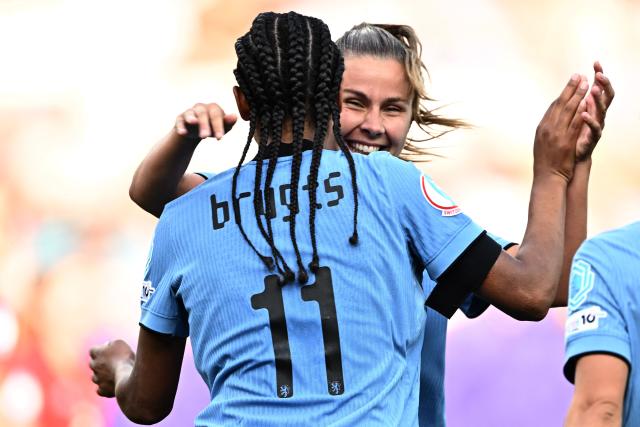 Netherlands' forward #11 Esmee Brugts celebrates scoring a goal with Netherlands' midfielder #17 Victoria Pelova during the UEFA Women's Euro 2025 Group D football match between Wales and The Netherlands at the Allmend Stadion Luzern in Lucerne on July 5, 2025. (Photo by Fabrice COFFRINI / AFP)