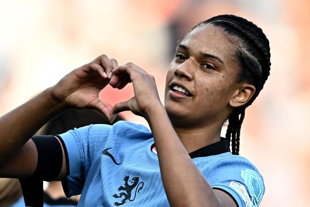 Netherlands' forward #11 Esmee Brugts celebrates scoring a goal during the UEFA Women's Euro 2025 Group D football match between Wales and The Netherlands at the Allmend Stadion Luzern in Lucerne on July 5, 2025. (Photo by Fabrice COFFRINI / AFP)