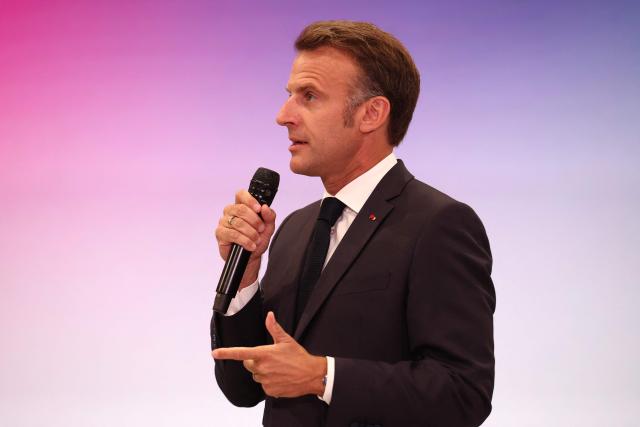 France's President Emmanuel Macron delivers a speech during a rally marking the 10th anniversary of "Les Jeunes avec Macron" (Youth with Macron), the youth movement of the Renaissance party, at the Cirque d'Hiver in Paris on July 5, 2025. (Photo by Sebastien DUPUY / AFP)