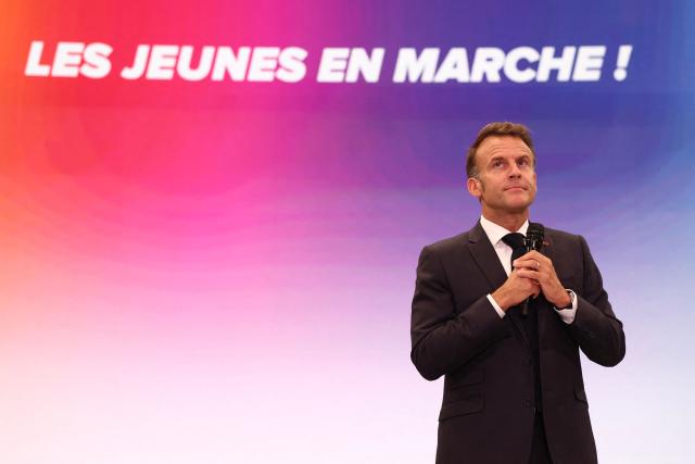 France's President Emmanuel Macron delivers a speech during a rally marking the 10th anniversary of "Les Jeunes avec Macron" (Youth with Macron), the youth movement of the Renaissance party, at the Cirque d'Hiver in Paris on July 5, 2025. (Photo by Sebastien DUPUY / AFP)