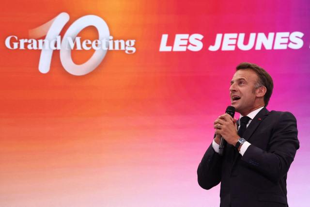 France's President Emmanuel delivers a speech during a rally marking the 10th anniversary of "Les Jeunes avec Macron" (Youth with Macron), the youth movement of the Renaissance party, at the Cirque d'Hiver in Paris on July 5, 2025. (Photo by Sebastien DUPUY / AFP)