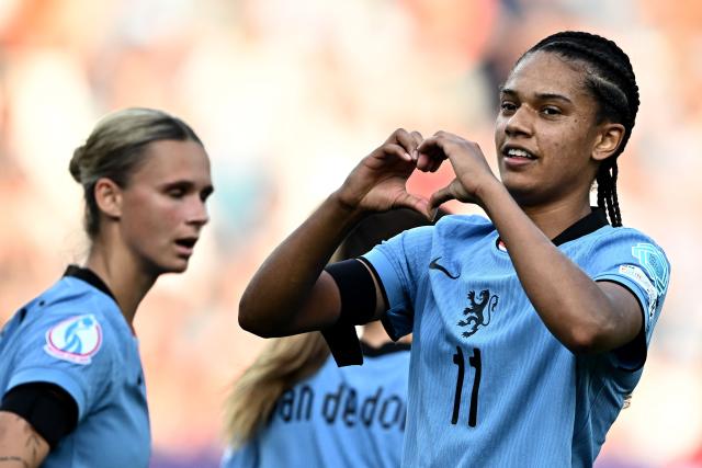 Netherlands' forward #11 Esmee Brugts celebrates scoring a goal during the UEFA Women's Euro 2025 Group D football match between Wales and The Netherlands at the Allmend Stadion Luzern in Lucerne on July 5, 2025. (Photo by Fabrice COFFRINI / AFP)