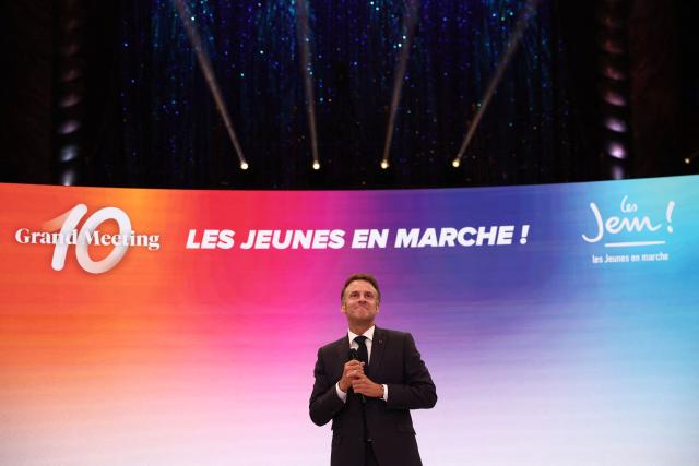 France's President Emmanuel delivers a speech during a rally marking the 10th anniversary of "Les Jeunes avec Macron" (Youth with Macron), the youth movement of the Renaissance party, at the Cirque d'Hiver in Paris on July 5, 2025. (Photo by Sebastien DUPUY / AFP)
