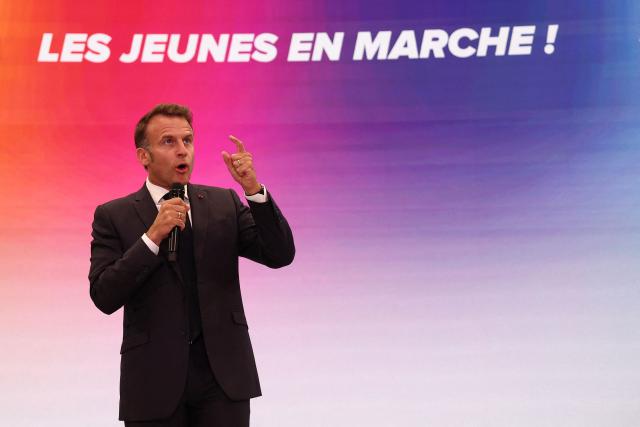 France's President Emmanuel delivers a speech during a rally marking the 10th anniversary of "Les Jeunes avec Macron" (Youth with Macron), the youth movement of the Renaissance party, at the Cirque d'Hiver in Paris on July 5, 2025. (Photo by Sebastien DUPUY / AFP)