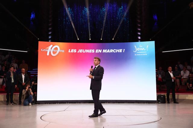 France's President Emmanuel Macron delivers a speech during a rally marking the 10th anniversary of "Les Jeunes avec Macron" (Youth with Macron), the youth movement of the Renaissance party, at the Cirque d'Hiver in Paris on July 5, 2025. (Photo by Sebastien DUPUY / AFP)