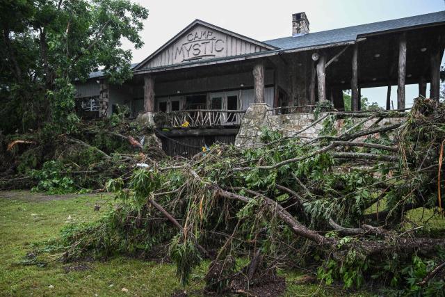 A view of Camp Mystic, the site of where at least 20 girls are missing after flash flooding in Hunt, Texas, on July 5, 2025. Rescuers were on Saturday searching for more than 20 girls missing from a riverside summer camp in the US state of Texas, after torrential rains caused devastating flooding that killed at least 27 people -- with more rain on the way. "So far, we've evacuated over 850 uninjured people, eight injured people and have recovered 27 deceased fatalities at this time. Of these 27, 18 are adults, nine are children," said Kerr Country Sheriff Larry Leitha on July 5. (Photo by RONALDO SCHEMIDT / AFP)