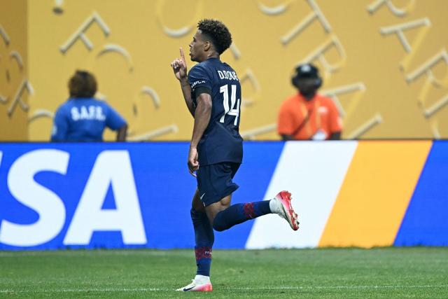 Paris Saint-Germain's French midfielder #14 Desire Doue celebrates scoring the opening goal during the FIFA Club World Cup 2025 quarterfinal football match between France's Paris Saint-Germain and Germany's Bayern Munich at the Mercedes-Benz Stadium in Atlanta on July 5, 2025. (Photo by PATRICIA DE MELO MOREIRA / AFP)