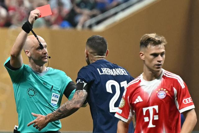 English referee Anthony Taylor shows a red card to Paris Saint-Germain's French defender #21 Lucas Hernandez during the FIFA Club World Cup 2025 quarterfinal football match between France's Paris Saint-Germain and Germany's Bayern Munich at the Mercedes-Benz Stadium in Atlanta on July 5, 2025. (Photo by Paul ELLIS / AFP)