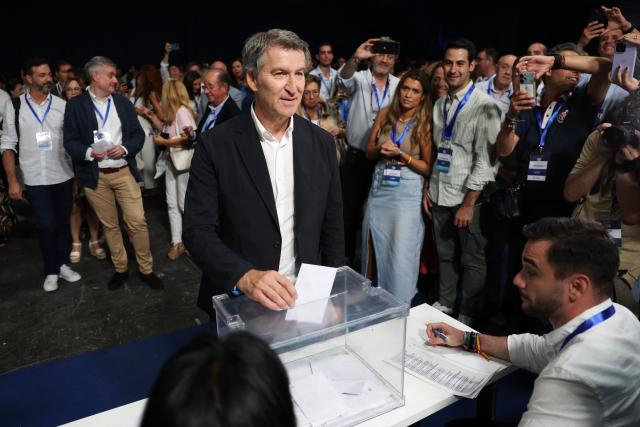 Spain's opposition right-wing Popular Party (PP) leader Alberto Nunez Feijoo casts his ballot he votes at the PP national congress in Madrid on July 5, 2025. (Photo by Thomas COEX / AFP)