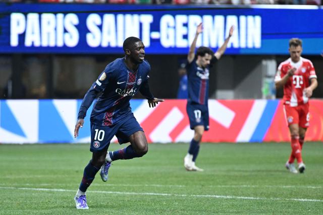 Paris Saint-Germain's French forward #10 Ousmane Dembele celebrates scoring his team's second goal during the FIFA Club World Cup 2025 quarterfinal football match between France's Paris Saint-Germain and Germany's Bayern Munich at the Mercedes-Benz Stadium in Atlanta on July 5, 2025. (Photo by PATRICIA DE MELO MOREIRA / AFP)