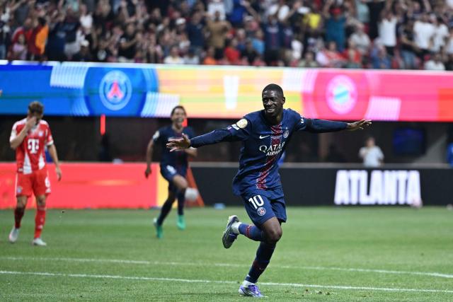 Paris Saint-Germain's French forward #10 Ousmane Dembele celebrates scoring his team's second goal during the FIFA Club World Cup 2025 quarterfinal football match between France's Paris Saint-Germain and Germany's Bayern Munich at the Mercedes-Benz Stadium in Atlanta on July 5, 2025. (Photo by PATRICIA DE MELO MOREIRA / AFP)