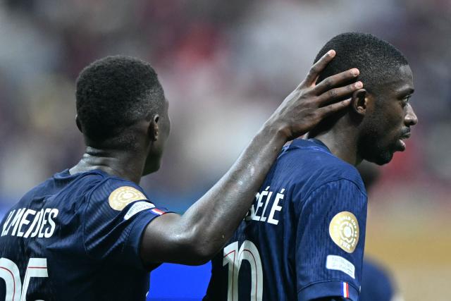 Paris Saint-Germain's French forward #10 Ousmane Dembele (R) celebrates scoring his team's second goal during the FIFA Club World Cup 2025 quarterfinal football match between France's Paris Saint-Germain and Germany's Bayern Munich at the Mercedes-Benz Stadium in Atlanta on July 5, 2025. (Photo by PATRICIA DE MELO MOREIRA / AFP)