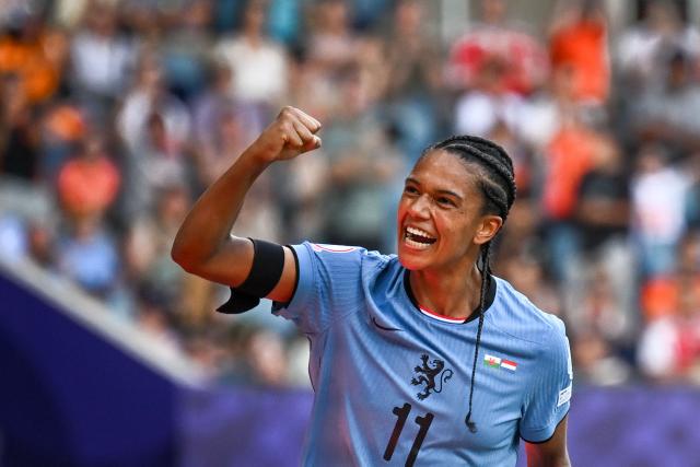 Netherlands' forward #11 Esmee Brugts celebrate the third goal of the match during the UEFA Women's Euro 2025 Group D football match between Wales and The Netherlands at the Allmend Stadion Luzern in Lucerne on July 5, 2025. (Photo by Fabrice COFFRINI / AFP)