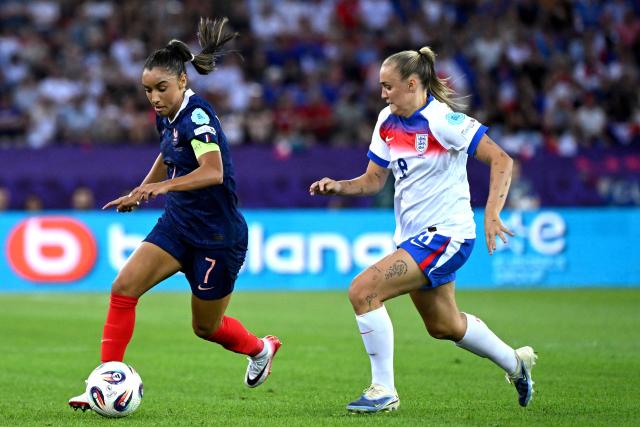 France's midfielder #07 Sakina Karchaoui and England's midfielder #08 Georgia Stanway fight for the ball during the UEFA Women's Euro 2025 Group D football match between France and England at the Letzigrund Stadium in Zurich, on July 5, 2025. (Photo by Miguel MEDINA / AFP)