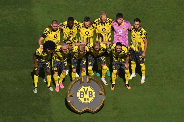 Borussia Dortmund's players pose for a team photo ahead of the the FIFA Club World Cup 2025 quarterfinal football match between Spain's Real Madrid and Germany's Borussia Dortmund at the MetLife stadium in East Rutherford, New Jersey on July 05, 2025. (Photo by ANGELA WEISS / AFP)