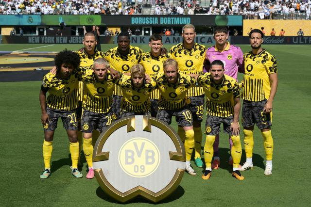 Borussia Dortmund's players pose for a team photo ahead of the the FIFA Club World Cup 2025 quarterfinal football match between Spain's Real Madrid and Germany's Borussia Dortmund at the MetLife stadium in East Rutherford, New Jersey on July 05, 2025. (Photo by JUAN MABROMATA / AFP)