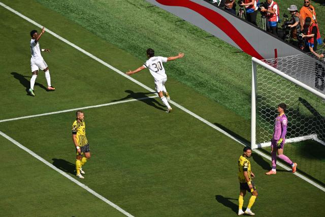 Real Madrid's Spanish forward #30 Gonzalo Garcia celebrates after scoring his team's first goal  during the FIFA Club World Cup 2025 quarterfinal football match between Spain's Real Madrid and Germany's Borussia Dortmund at the MetLife stadium in East Rutherford, New Jersey on July 05, 2025. (Photo by ANGELA WEISS / AFP)
