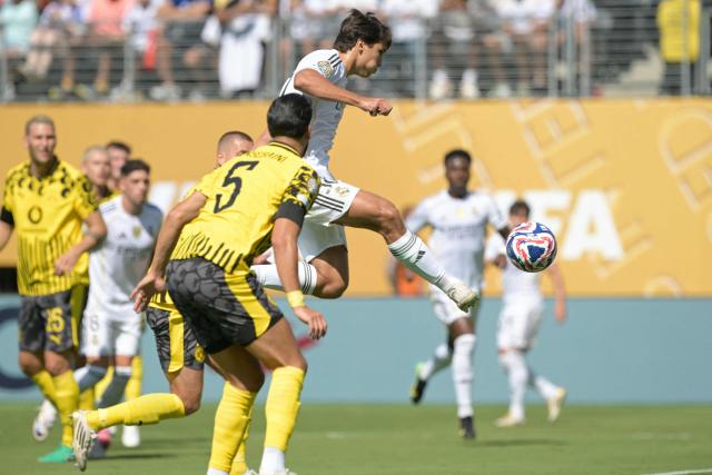 Real Madrid's Spanish forward #30 Gonzalo Garcia scores his team's first goal  during the FIFA Club World Cup 2025 quarterfinal football match between Spain's Real Madrid and Germany's Borussia Dortmund at the MetLife stadium in East Rutherford, New Jersey on July 05, 2025. (Photo by JUAN MABROMATA / AFP)