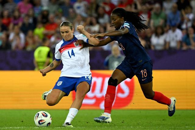 England's midfielder #14 Grace Clinton and France's midfielder #18 Oriane Jean-François during the UEFA Women's Euro 2025 Group D football match between France and England at the Letzigrund Stadium in Zurich, on July 5, 2025. (Photo by Miguel MEDINA / AFP)