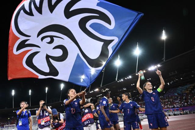 France's defender #13 Selma Bacha and France's midfielder #06 Sandie Toletti celebrate at the end of the UEFA Women's Euro 2025 Group D football match between France and England at the Letzigrund Stadium in Zurich, on July 5, 2025. France won 2-0 over England. (Photo by SEBASTIEN BOZON / AFP)