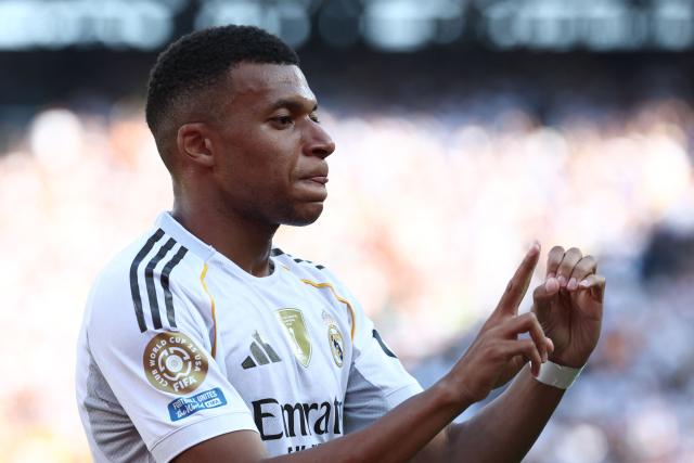 Real Madrid's French forward #09 Kylian Mbappe celebrates scoring his team's third goal during the FIFA Club World Cup 2025 quarterfinal football match between Spain's Real Madrid and Germany's Borussia Dortmund at the MetLife stadium in East Rutherford, New Jersey on July 05, 2025. (Photo by FRANCK FIFE / AFP)