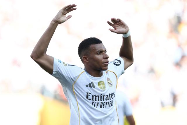Real Madrid's French forward #09 Kylian Mbappe celebrates scoring his team's third goal during the FIFA Club World Cup 2025 quarterfinal football match between Spain's Real Madrid and Germany's Borussia Dortmund at the MetLife stadium in East Rutherford, New Jersey on July 05, 2025. (Photo by FRANCK FIFE / AFP)