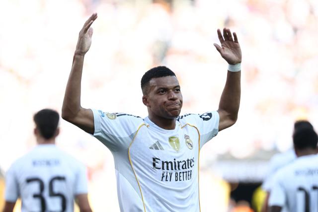 Real Madrid's French forward #09 Kylian Mbappe celebrates scoring his team's third goal during the FIFA Club World Cup 2025 quarterfinal football match between Spain's Real Madrid and Germany's Borussia Dortmund at the MetLife stadium in East Rutherford, New Jersey on July 05, 2025. (Photo by FRANCK FIFE / AFP)