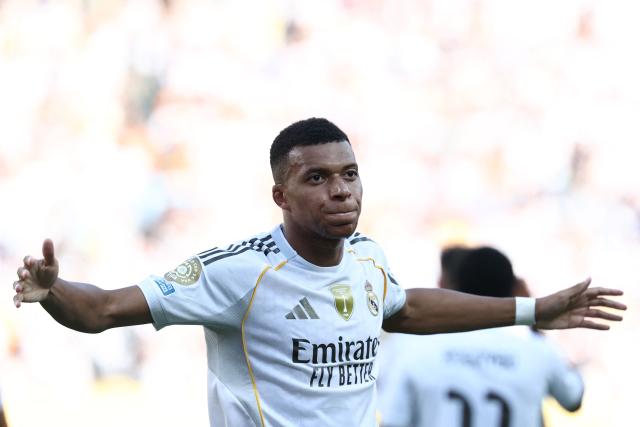 Real Madrid's French forward #09 Kylian Mbappe celebrates scoring his team's third goal during the FIFA Club World Cup 2025 quarterfinal football match between Spain's Real Madrid and Germany's Borussia Dortmund at the MetLife stadium in East Rutherford, New Jersey on July 05, 2025. (Photo by FRANCK FIFE / AFP)