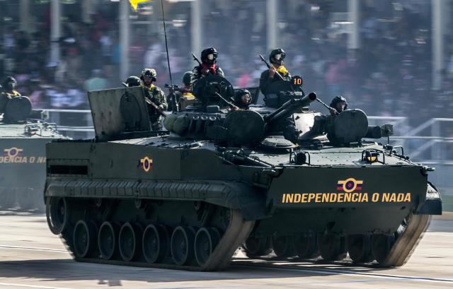 A Venezuelan Army tank of Russian origin takes part in a military paradae during celebrations for the Independence Day, in Caracas on July 5, 2025. (Photo by Juan BARRETO / AFP)