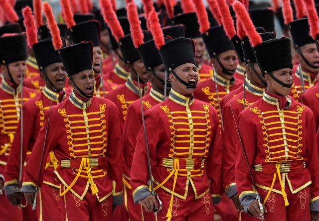 Venezuelan Army members march during a military parade within celebrations for the Independence Day, in Caracas on July 5, 2025. (Photo by Juan BARRETO / AFP)