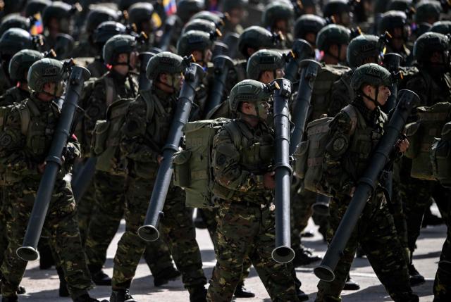 Venezuelan Army members march during a military parade within celebrations for the Independence Day, in Caracas on July 5, 2025. (Photo by Juan BARRETO / AFP)