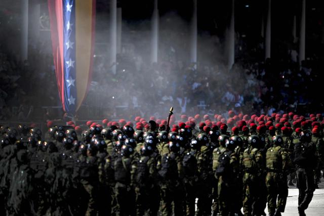 Venezuelan Army members march during a military parade within celebrations for the Independence Day, in Caracas on July 5, 2025. (Photo by Juan BARRETO / AFP)