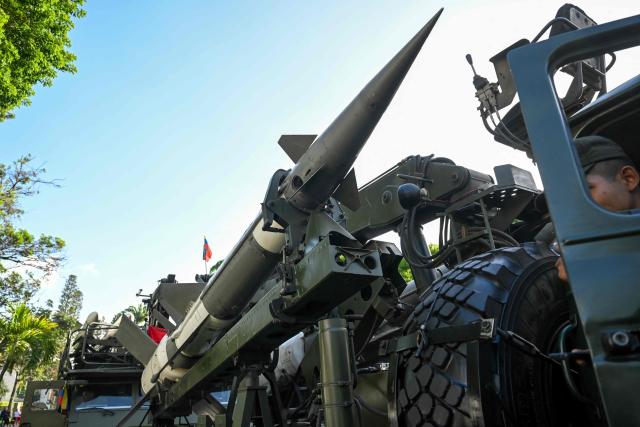 A Venezuelan Army truck carrying Russian missile launchers takes part in a military parade during celebrations for the Independence Day, in Caracas on July 5, 2025. (Photo by Juan BARRETO / AFP)