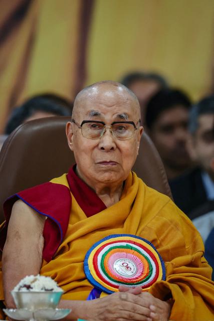 Tibetan spiritual leader the Dalai Lama attends a prayer ceremony celebrating his 90th birth anniversary at the Main Tibetan Temple in McLeod Ganj, near Dharamsala, on July 6, 2025. Calling himself a "simple Buddhist monk" who usually didn't celebrate birthdays, the Dalai Lama marked his 90th on July 6 by praying for peace after China insisted it would have final say on who succeeded the Tibetan spiritual leader. (Photo by Niharika KULKARNI / AFP)
