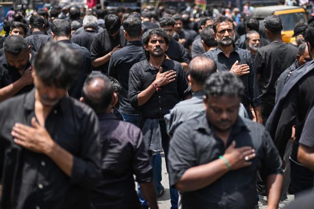 Shiite Muslims flagellate themselves during a religious procession marking Ashura, the tenth day of the Islamic holy month of Muharram, in Chennai on July 6, 2025. (Photo by R.Satish BABU / AFP)