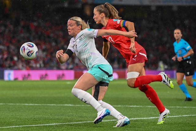 Iceland's forward #03 Sandra Jessen and Switzerland's midfielder #13 Lia Walti fight for the ball during the UEFA Women's Euro 2025 Group A football match between Switzerland and Iceland at the Wankdorf stadium in Bern, on July 6, 2025. (Photo by SEBASTIEN BOZON / AFP)