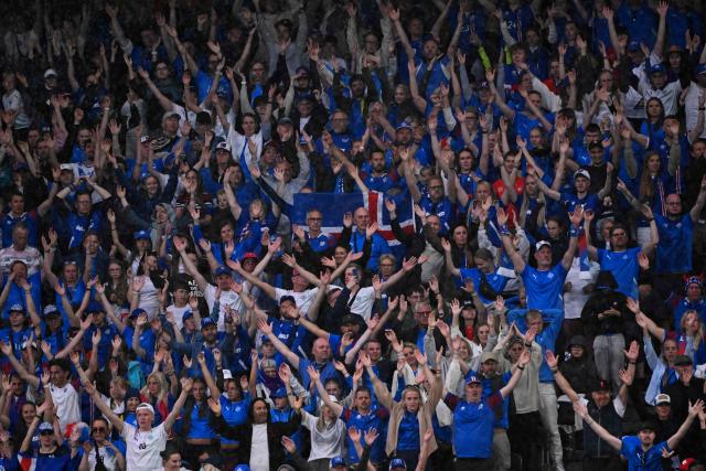 Iceland fans clap during the UEFA Women's Euro 2025 Group A football match between Switzerland and Iceland at the Wankdorf stadium in Bern, on July 6, 2025. (Photo by SEBASTIEN BOZON / AFP)