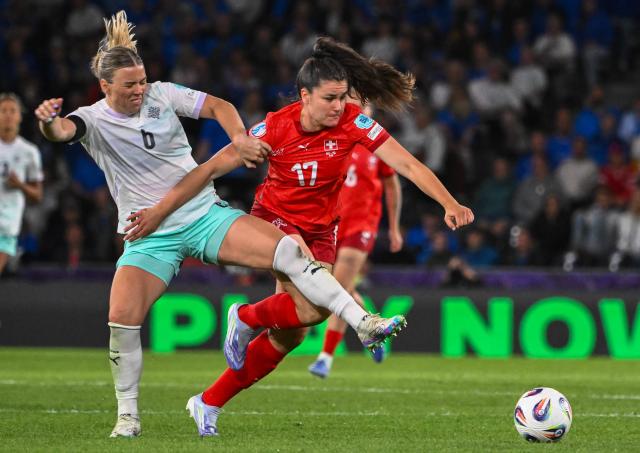 Iceland's defender #06 Ingibjorg Sigurdardottir and Switzerland's forward #17 Svenja Folmli fight for the ball during the UEFA Women's Euro 2025 Group A football match between Switzerland and Iceland at the Wankdorf stadium in Bern, on July 6, 2025. (Photo by SEBASTIEN BOZON / AFP)
