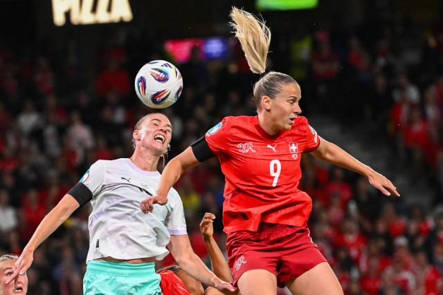 Iceland's midfielder #08 Alexandra Johannsdottir and Switzerland's forward #09 Ana-Maria Crnogorcevic fight for the ball during the UEFA Women's Euro 2025 Group A football match between Switzerland and Iceland at the Wankdorf stadium in Bern, on July 6, 2025. (Photo by SEBASTIEN BOZON / AFP)
