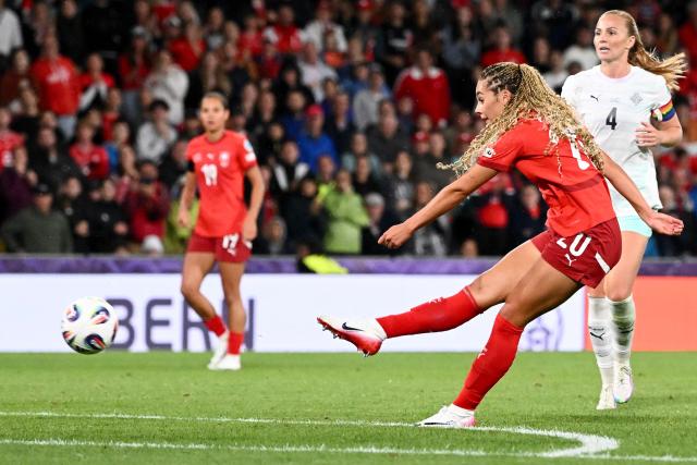 Switzerland's forward #20 Alayah Pilgrim shoots to score the team's second goal of the match during the UEFA Women's Euro 2025 Group A football match between Switzerland and Iceland at the Wankdorf stadium in Bern, on July 6, 2025. (Photo by SEBASTIEN BOZON / AFP)
