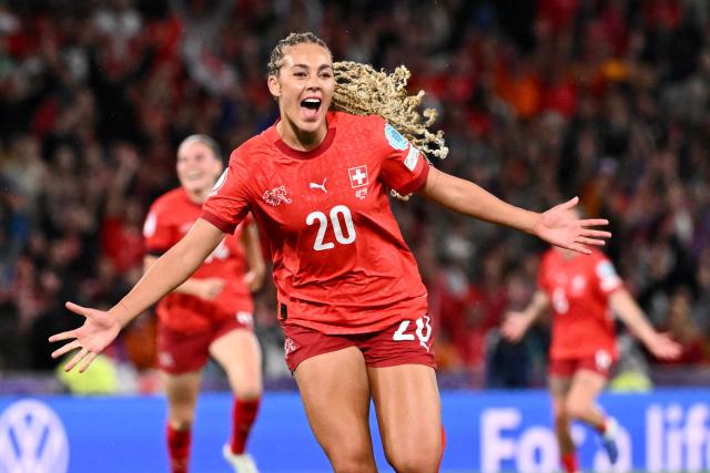TOPSHOT - Switzerland's forward #20 Alayah Pilgrim celebrates after scoring the second goal of the match during the UEFA Women's Euro 2025 Group A football match between Switzerland and Iceland at the Wankdorf stadium in Bern, on July 6, 2025. (Photo by SEBASTIEN BOZON / AFP)