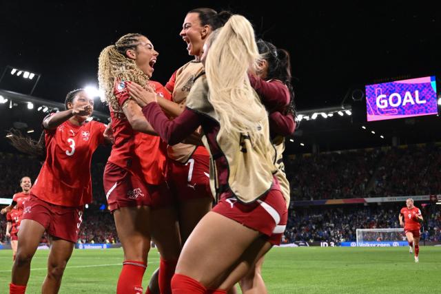 Switzerland's forward #20 Alayah Pilgrim (C) celebrates with teammates after scoring the second goal of the match during the UEFA Women's Euro 2025 Group A football match between Switzerland and Iceland at the Wankdorf stadium in Bern, on July 6, 2025. (Photo by SEBASTIEN BOZON / AFP)