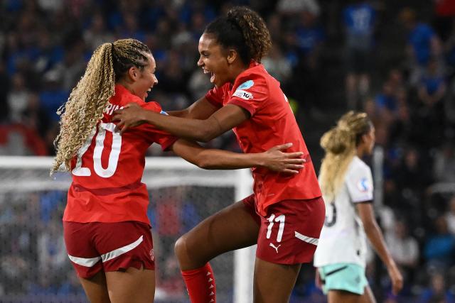 Switzerland's forward #20 Alayah Pilgrim and Switzerland's midfielder #11 Coumba Sow celebrate after beating Iceland 2-0 at the end of the UEFA Women's Euro 2025 Group A football match between Switzerland and Iceland at the Wankdorf stadium in Bern, on July 6, 2025. (Photo by SEBASTIEN BOZON / AFP)